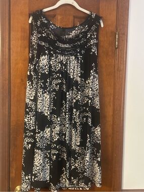 Sleeveless Black and White Midi Dress with Ruffled Yoke